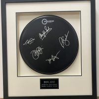 framed drum signed by Bon jovi