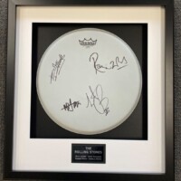 framed drum signed by The Rolling Stones