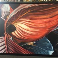 framed artwork of large red & blue leaves