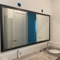 framed bathroon mirror